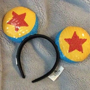 Loungefly Pixar Mickey ears. New without tags; worn once.